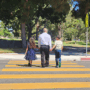 P-B10-W98-04-Children-crossing-the-street-holding-hands-with-an-adult
