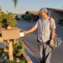 P-B4-W37-04-Mail-carrier-delivering-a-letter