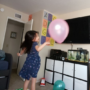 P-B6-W59-08-Child-trying-to-keep-a-balloon-in-the-air