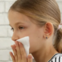 P-B7-W68-08-Child-cleaning-her-face-with-a-napkin