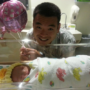 P-B9-W81-04-Father-with-newborn